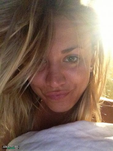 Kaley Cuoco leaked selfie of messy hair and duckface on bed