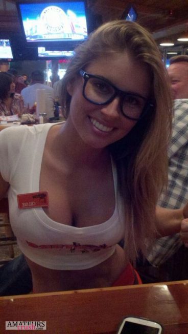 Barista with glasses Chloe showing her big breasts cleavage