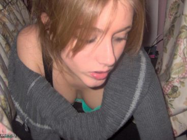 Down blouse teen tits showing her cleavage underneath her sweater